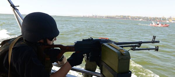 Pripadnik ukrajinske obalske straže na Azovskom moru - Sputnik Srbija