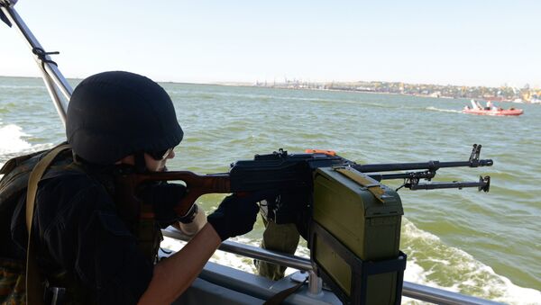 Припадник украјинске обалске страже на Азовском мору - Sputnik Србија