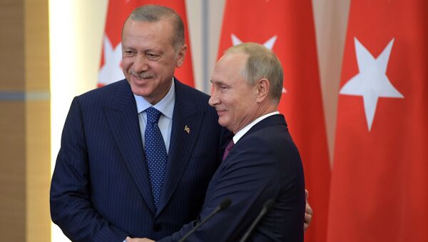 Председници Турске и Русије, Реџеп Тајип Ердоган и Владимир Путин, након састанка у Сочију - Sputnik Србија