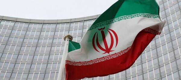 Иранска застава испред зграде Међународне агенције за атомску енергију (ИАЕА) у Бечу - Sputnik Србија