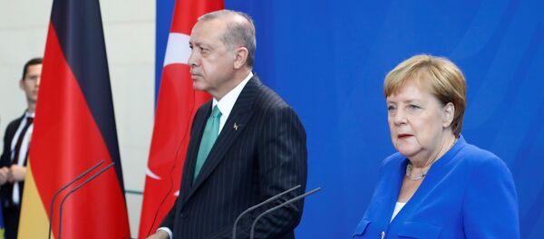 Немачка канцеларка Ангела Меркел и председник Турске Реџеп Тајип Ердоган Немачка канцеларка Ангела Меркел и председник Турске Реџеп Тајип Ердоган - Sputnik Србија