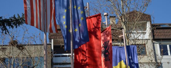 Заставе тзв. Косова,ЕУ, САД и Албаније у Приштини Заставе тзв. Косова,ЕУ, САД и Албаније у Приштини - Sputnik Србија
