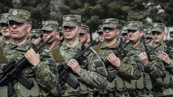 Припадници Безбедносних снага Косова на церемонији прославе Ослободилачке војске Косова у Приштини - Sputnik Србија