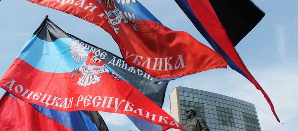 Заставе Доњецке Народне Републике на прослави годишњице проглашења независности ДНР у Доњецку - Sputnik Србија