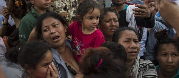 Deca i žene migranti na granici Meksika i Gvatemale - Sputnik Srbija