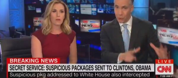 Trenutak u kom je Si-En-En evakuisan zbog dojave o bombi Trenutak u kom je Si-En-En evakuisan zbog dojave o bombi - Sputnik Srbija