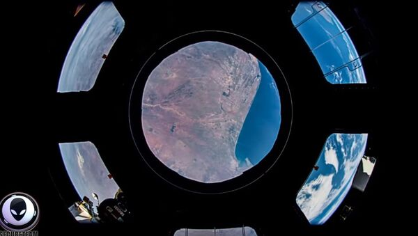 Аномалија у свемиру забележена камером са МСС-а. - Sputnik Србија