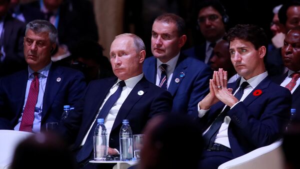 Hašim Tači i Vladimir Putin na Mirovnom forumu u Parizu - Sputnik Srbija