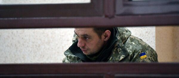 Један од притворених морнара са украјинских ратних бродова, капетан 3. класе Владимир Лесовој у суду у Симферопољу - Sputnik Србија