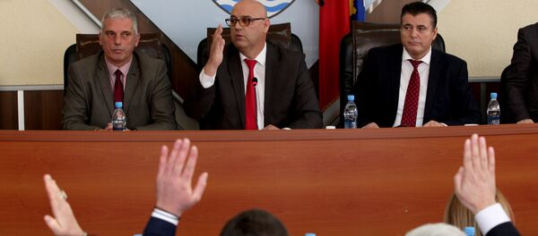 Glasanje u gradskoj skupštini Južne Mitrovice Glasanje u gradskoj skupštini Južne Mitrovice - Sputnik Srbija