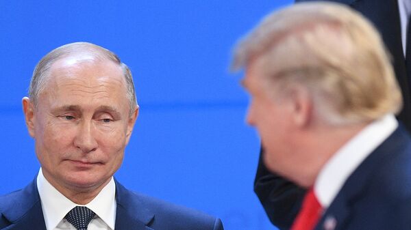 Predsednik Rusije Vladimir Putin i predsednik SAD Donald Tramp na samitu G20 u Argentini - Sputnik Srbija