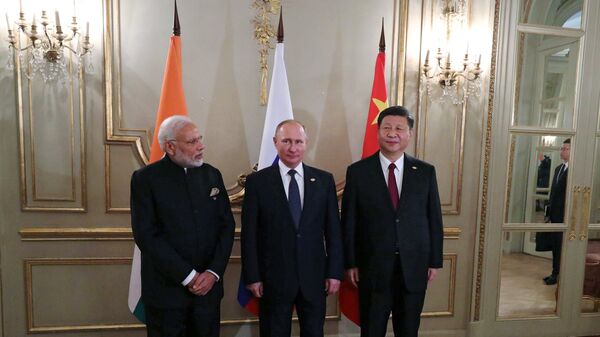 Predsednik Rusije Vladimir Putin, predsednik Kine Si Đinping i premijer Indije Narendra Modi - Sputnik Srbija