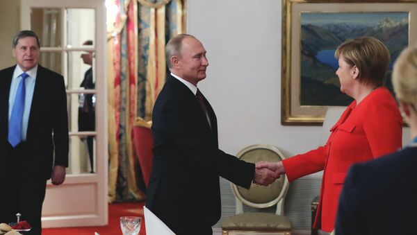Vladimir Putin i Angela Merkel u Buenos Ajresu - Sputnik Srbija