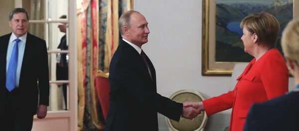 Владимир Путин и Ангела Меркел у Буенос Ајресу Владимир Путин и Ангела Меркел у Буенос Ајресу - Sputnik Србија