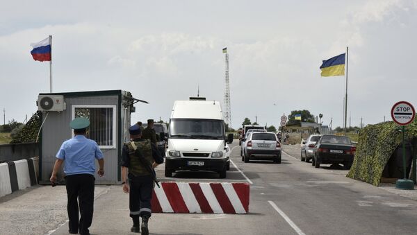 Automobili na graničnom prelazu Džankoj na granici Rusije i Ukrajine - Sputnik Srbija