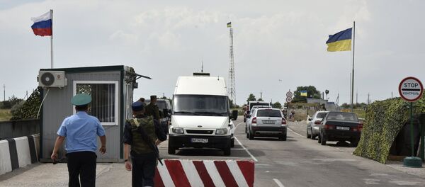 Automobili na graničnom prelazu Džankoj na granici Rusije i Ukrajine - Sputnik Srbija