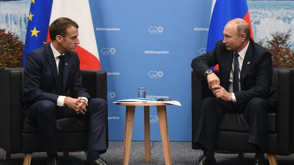 Predsednici Francuske i Rusije, Emanuel Makron i Vladimir Putin, na marginama Samita G20 u Argentini - Sputnik Srbija