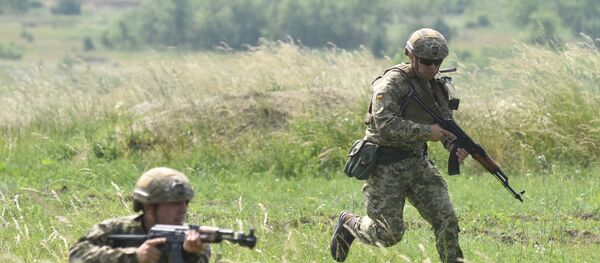 Припадници украјинске војске за време тактичких војних вежби у Лавовској области Припадници украјинске војске за време тактичких војних вежби у Лавовској области - Sputnik Србија