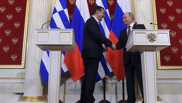 Премијер Грчке Алексис Ципрас и председник Русије Владимир Путин - Sputnik Србија