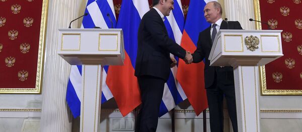 Премијер Грчке Алексис Ципрас и председник Русије Владимир Путин - Sputnik Србија