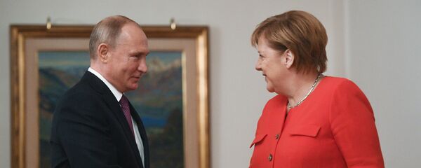 Predsednik Rusije Vladimir Putin i nemačka kancelarka Angela Merkel Predsednik Rusije Vladimir Putin i nemačka kancelarka Angela Merkel - Sputnik Srbija