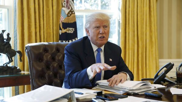 U.S. President Donald Trump is interviewed by Reuters in the Oval Office at the White House in Washington - Sputnik Србија