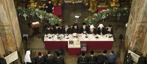 Predsednik Ukrajine Petro Porošenko prisustvuje ujediniteljskom saboru ukrajinske pravoslavne crkve u crkvi Svete Sofije u Kijevu - Sputnik Srbija