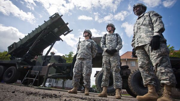 Američki vojnici pored lansirnog protivraketnog sistema Patriot u Poljskoj - Sputnik Srbija