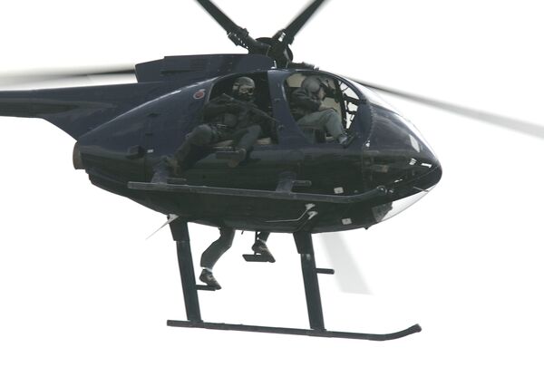 Плаћеници Блеквотера у хеликоптеру у Ираку Плаћеници Блеквотера у хеликоптеру у Ираку - Sputnik Србија