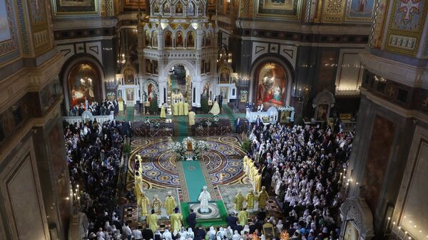 Божићна литургија у храму Христа Спаситеља у Москви - Sputnik Србија
