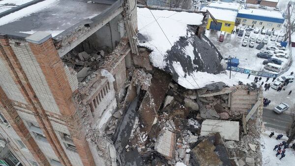 Уништени станови након експлозије гаса у згради у граду Шахти Ростовске области - Sputnik Србија