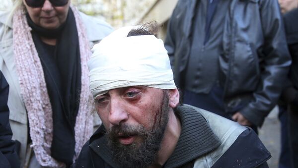 Grčki fotograf, dopisnik Sputnjika Kostis Dadamis nakon napada na protestu u Atini - Sputnik Srbija