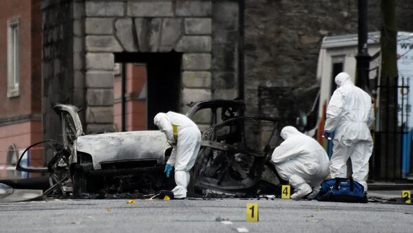 Форензичари на месту где је експлодирала аутомобил-бомба у Лондондерију, 20.01.2019., Северна Ирска - Sputnik Србија