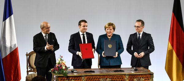 Емануел Макрон и Ангела Меркел - Sputnik Србија