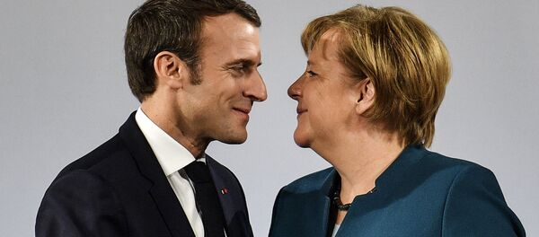 Емануел Макрон и Ангела Меркел Емануел Макрон и Ангела Меркел - Sputnik Србија