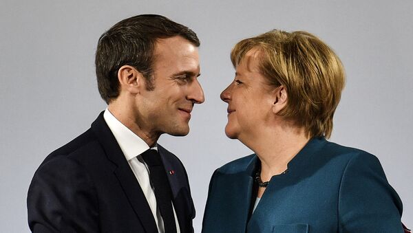 Emanuel Makron i Angela Merkel - Sputnik Srbija