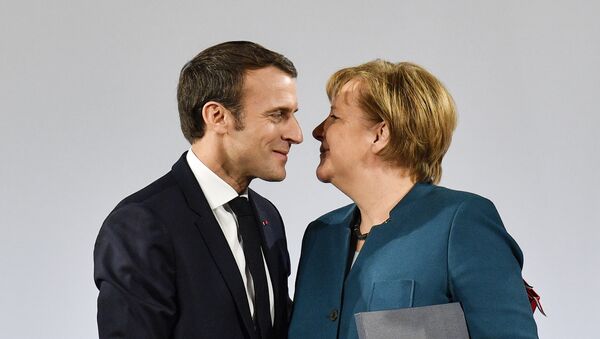 Angela Merkel i Emanuel Makron - Sputnik Srbija