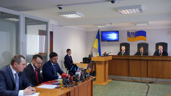 Advokati i sudije u sudu u Kijevu tokom izricanja presude Janukoviču - Sputnik Srbija