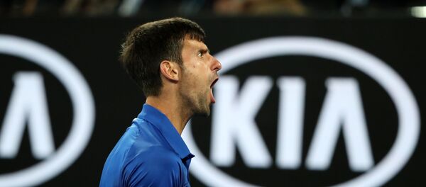 Српски тенисер Новак Ђоковић након постигнутог поена у финалном мечу Отвореног тениског првенства Аустралије у Мелбурну против Шпанца Рафаела Надала - Sputnik Србија