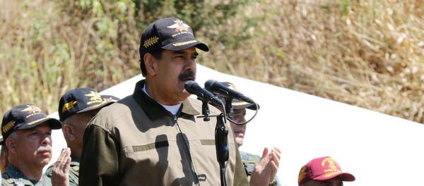 Председник Венецуеле Николас Мадуро на војној вежби у Каракасу Председник Венецуеле Николас Мадуро на војној вежби у Каракасу - Sputnik Србија