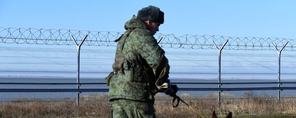 Жичани зид на граници Украјине и Русије Жичани зид на граници Украјине и Русије - Sputnik Србија