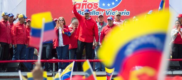 Присталице председника Венецуеле Николаса Мадура на митингу подршке у Каракасу - Sputnik Србија