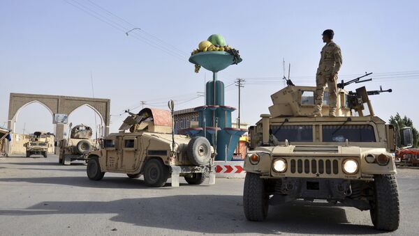Pripadnici bezbednosnih snaga Avganistana patroliraju u gradu Gazni zapadno od Kabula - Sputnik Srbija