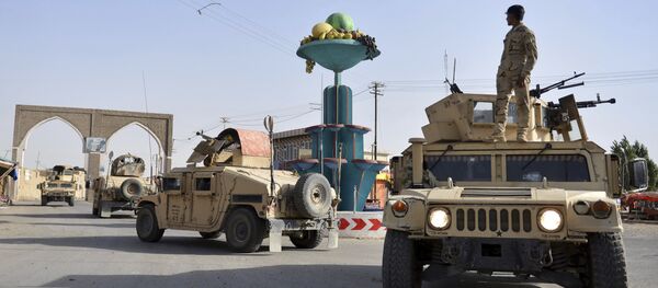 Припадници безбедносних снага Авганистана патролирају у граду Газни западно од Кабула - Sputnik Србија