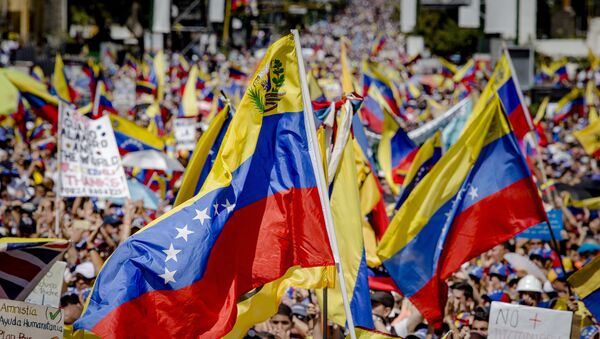 Митинг присталица опозиционог лидера Венецуеле Хуана Гваида у Каракасу - Sputnik Србија