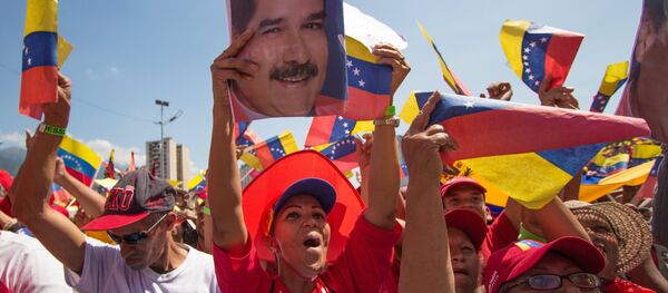 Митинг подршке председнику Венецуеле Николасу Мадуру у Каракасу - Sputnik Србија
