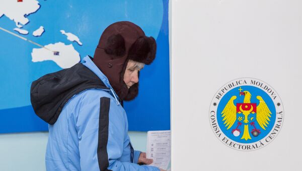 Žena glasa na parlamentarnim izborima u Moldaviji - Sputnik Srbija