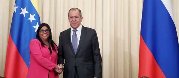Министар иностраних послова Русије Сергеј Лавров и заменица председника Венецуеле Делса Родригез Министар иностраних послова Русије Сергеј Лавров и заменица председника Венецуеле Делса Родригез - Sputnik Србија