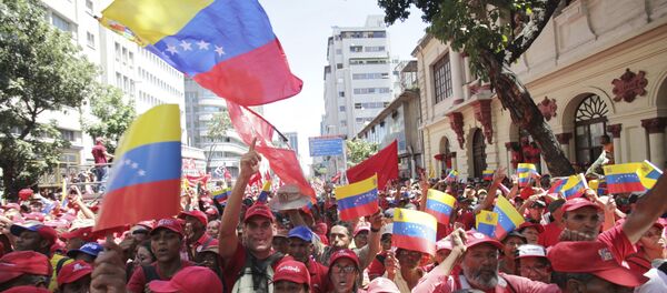 Присталице председника Венецуеле Николаса Мадура на митингу у Каракасу - Sputnik Србија