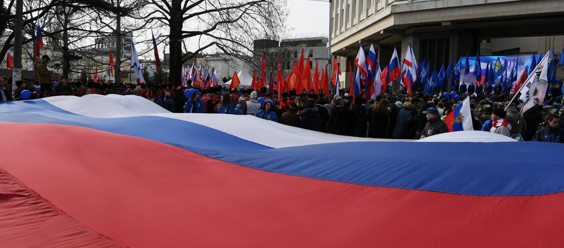 Zastava Rusije na obeležavanju godišnjice ujedinjenja Krima sa Rusijom - Sputnik Srbija, 1920, 16.03.2019